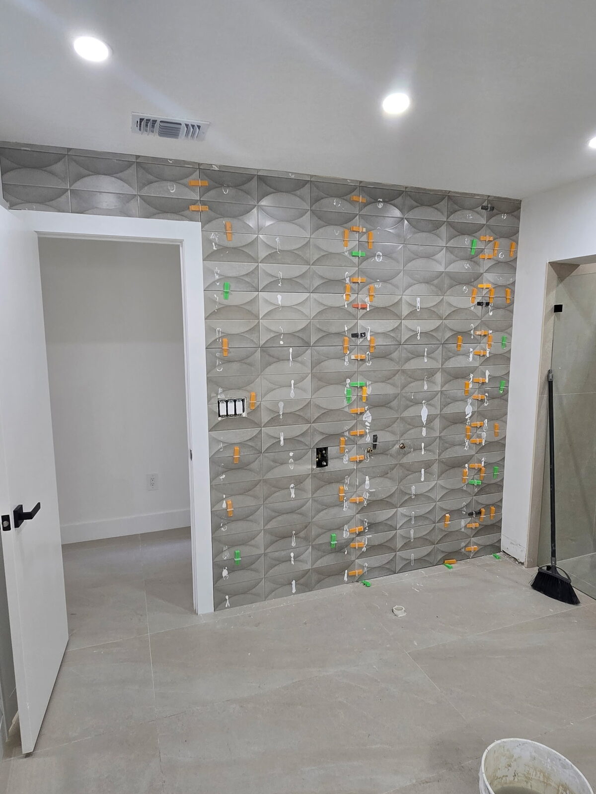 Textured feature wall tile installation