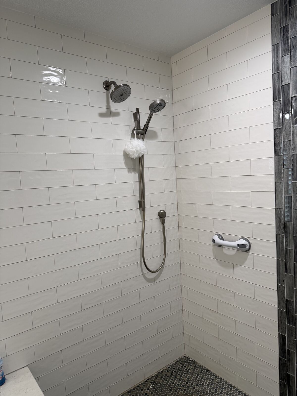 Tiled shower with handheld shower head installation